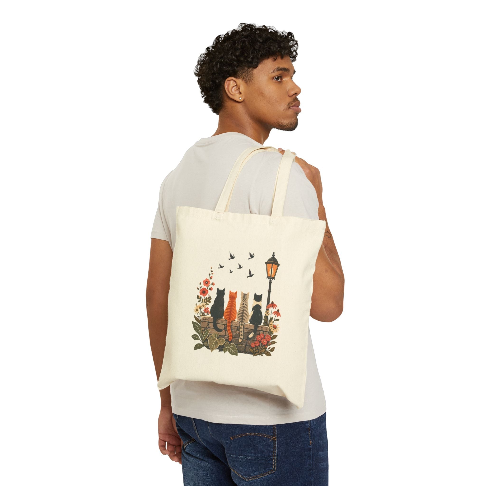 Cat Garden canvas tote bag worn over the shoulder